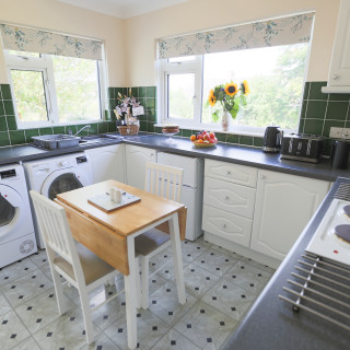 Well-equipped, bright kitchen in Wall & Lakes holiday cottage, Brampton